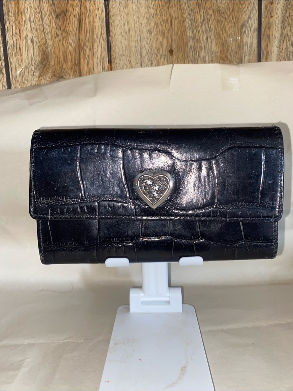 Brighton black embossed leather continental checkbook with a sliver tone heart